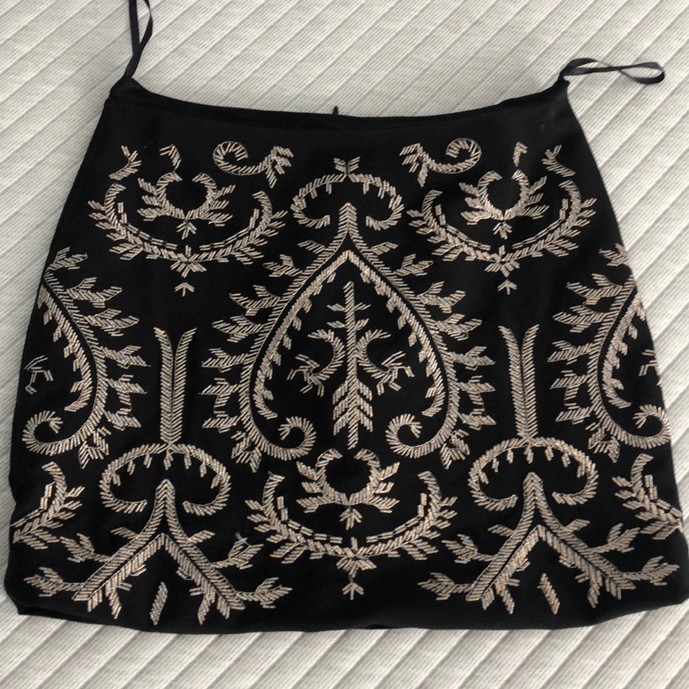 Black mini skirt with gold stitching